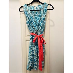 Fun blue patterned dress, with coral waist tie